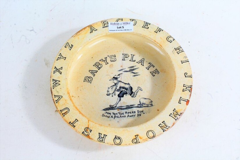 Early 20th century English pottery baby's plate, with the alphabet to the outer edge and 'Tom Tom