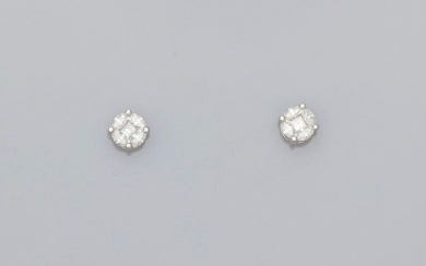 Earrings, each with a round motif, in white gold, 750 MM, covered with princess and shuttle-cut diamonds, 6 x 6 mm, weight: 2.05gr. rough.