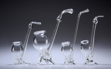 FOUR PORT (OR BRANDY) GLASS PIPES, each with tripod