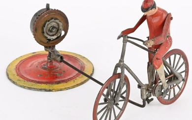 FRENCH WINDUP BICYCLE GO-ROUND