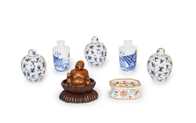 Five Chinese blue and white vases, a famille rose stand and a...
