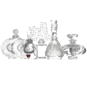 Four Lalique crystal perfume bottles