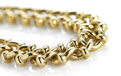 Georg Jensen & Wendel: A bracelet of 18k gold. L. app. 20.5 cm. Weight app. 137.5 g.