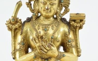 Gilt bronze image of a buddha. Tibet. 16th century.