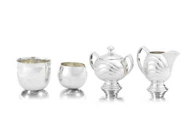 HECTOR MILLER: a silver cream jug and covered sugar bowl