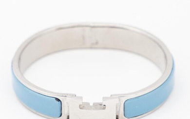 SOLD. Hermès: A "Clic H" bangle set with light blue enamel, mounted in palladium plated metal. W. app. 11.5 mm. Diam. app. 5.5 cm. – Bruun Rasmussen Auctioneers of Fine Art