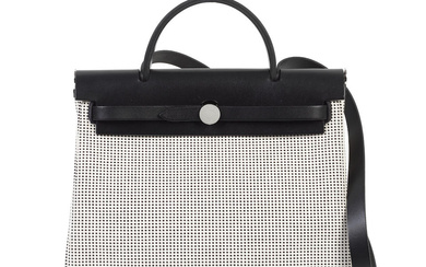 Hermès: a Black and White Vache Hunter Leather and Toile...