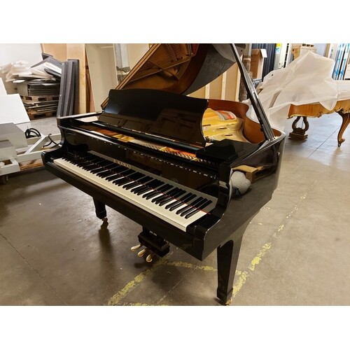 Kawai (c2008) A 5ft 10in Model RX2 grand piano in a bright e...