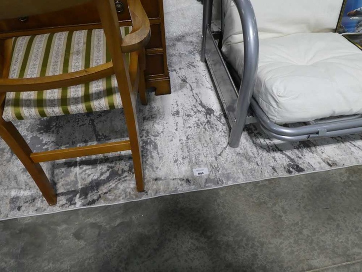 Large grey and beige mottled rug (approx. 6'x9')Large grey and...