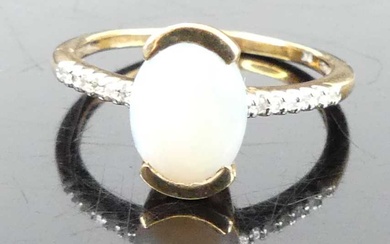 Lot details A 9ct gold opal dress ring, the shoulders...