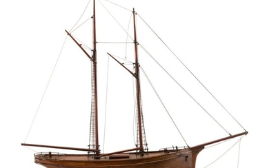 MODEL OF A TWO-MASTED SHIP Possibly sailor-made. Hull with deep brown patina. Goose's head-form tiller with movable rudder. Lead kee..