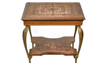 Marquetry Inlay parlor table with brass legs circa 1890