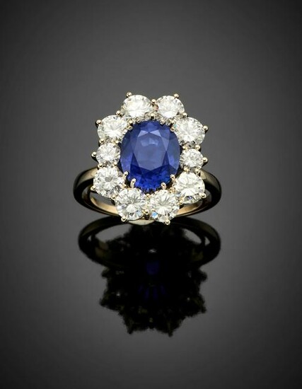 Oval ct. 3.70 sapphire and diamond white gold cluster