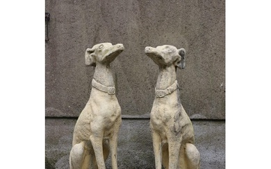 PAIR OF MOULDED STONE GARDEN SCULPTURES