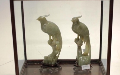 Pair Chinese carved jade bird figures each of a...