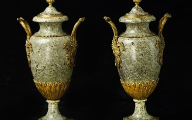 Pair of 19th century French granite and gilded bronze urns