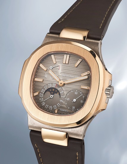 Patek Philippe, Ref. 5712GR A very rare and attractive white and pink gold wristwatch with power reserve, date, moonphases, box and certificate