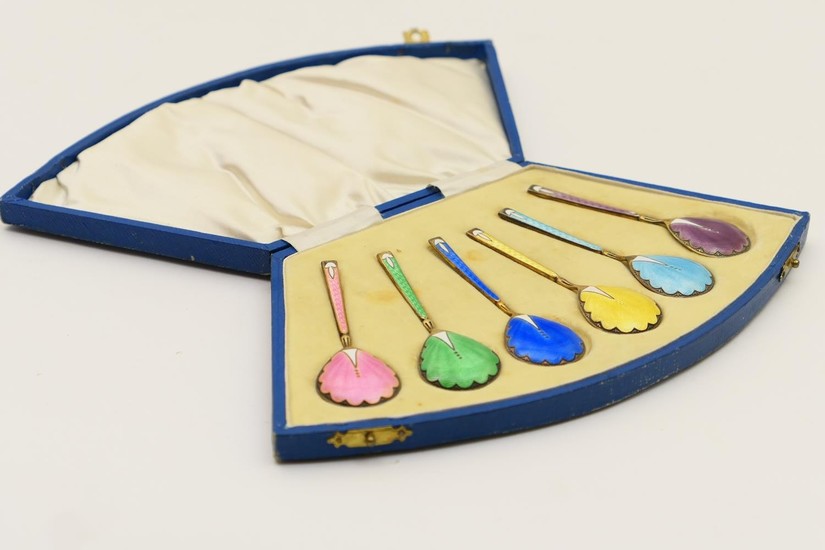 Set of six harlequin enamelled silver gilt coffee spoons, ma...