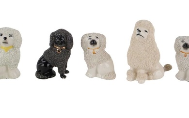 Seven Staffordshire Porcelain Miniature Dogs
