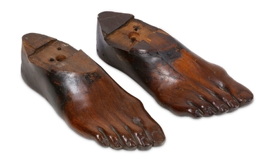 TREEN: A PAIR OF 19TH CENTURY CARVED FRUITWOOD RIGHT FEET