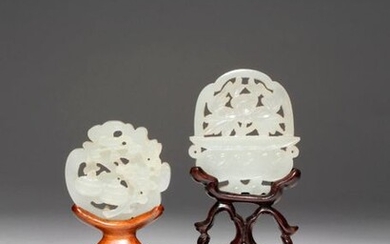 TWO CHINESE WHITE JADE OPENWORK PENDANTS QING DYNASTY One formed...