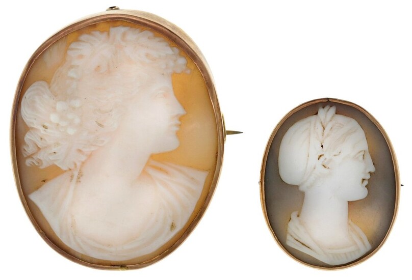 Two Shell Cameo Brooches The larger circa 1880, mounted in 9ct gold, with dents and abrasions.
