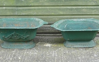 Two early 20thC cast iron pedestal planters / urns, one with relief detail. Approx. 26" wide x 10"