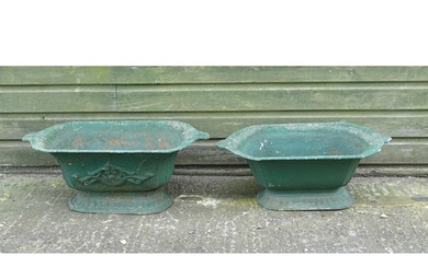 Two early 20thC cast iron pedestal planters / urns, one with...