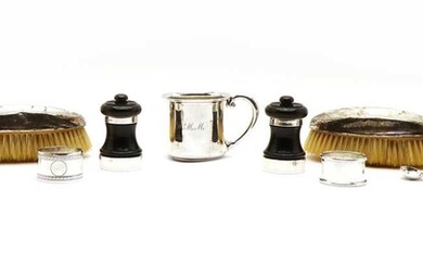 Two open salts and two ebonised pepper grinders