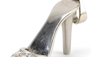 Unmarked white gold diamond charm in the form of a high heel...