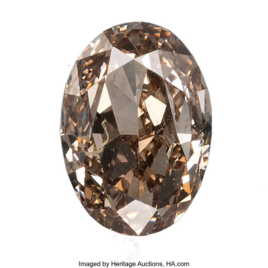 Unmounted Fancy Pink-Brown Diamond Diamond: Oval-shaped fancy pink-brown weighing...