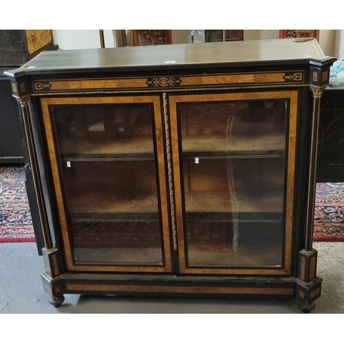 Victorian walnut and ebonised two door pier cabinet, the mou...