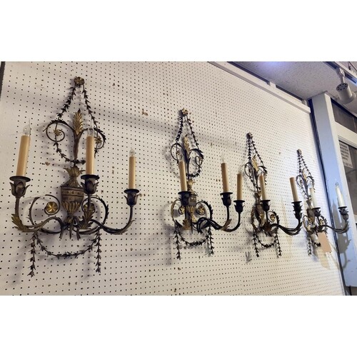 WALL SCONCES, a set of four, patinated metal with gilt folia...
