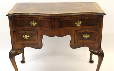 Walnut serpentine fronted dressing table in Queen Anne style...
