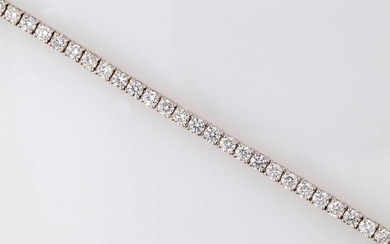 White gold line bracelet decorated with diamonds totalling approximately 2.9...
