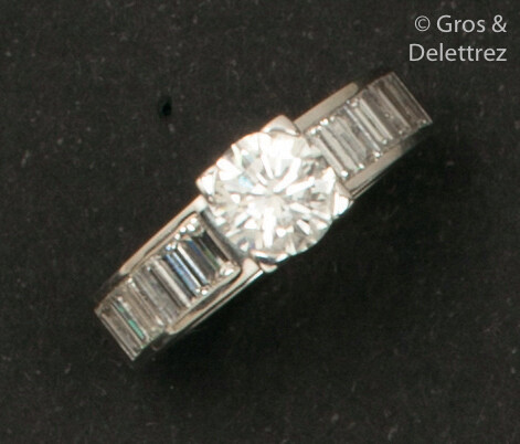 White gold ring, set with a brilliant-cut diamond...