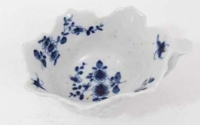 Worcester blue and white leaf moulded butter boat, circa 1755, decorated with floral sprays, painter's mark to bottom of handle, 8.5cm long