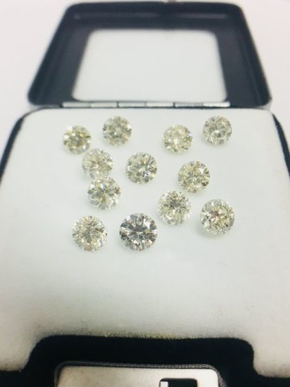 12 round brilliant cut diamonds,6.28ct total ,i/j colour,vs...