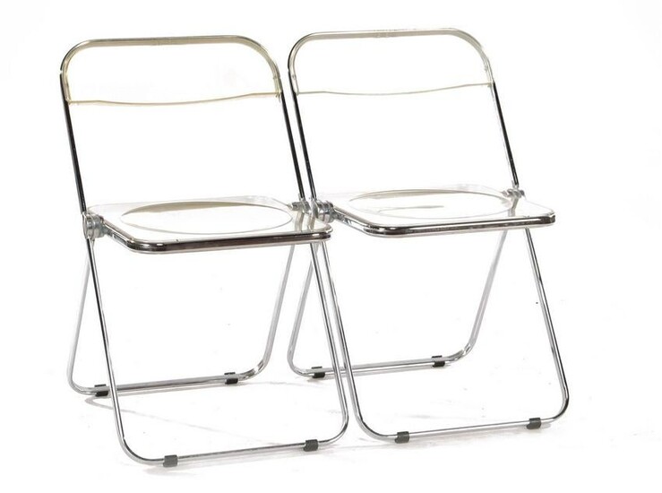 2 plastic folding chairs