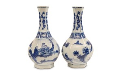A PAIR OF CHINESE BLUE AND WHITE VASES....
