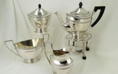 5-part tea set on a stove - .833 silver - Netherlands - Early 20th century
