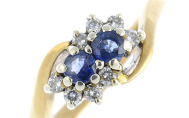 A 9ct gold sapphire and diamond crossover ring.