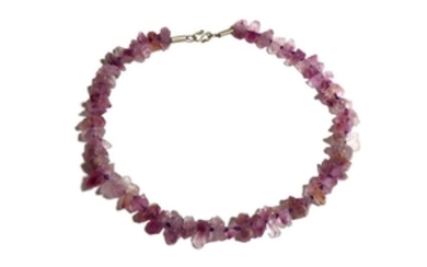 AN AMETHYST NECKLACE Restrung with a modern clasp, the