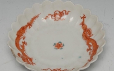 A Chelsea Red Dragon pattern fluted circular saucer
