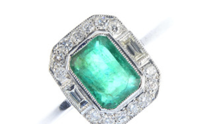 An emerald and diamond dress ring. View more details