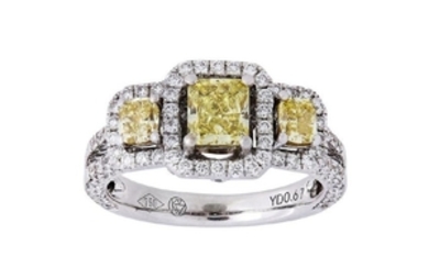 A fancy coloured diamond and diamond three-stone ring