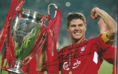 Football Steven Gerrard 12x8 signed colour photo pictured celebrating with the Champions League Trophy. Steven George Gerrard...