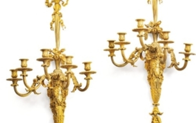 Henry Dasson (1825 - 1896) A pair of French gilt-bronze five-light wall-lights after a model by Pierre-Philippe Thomire, dated 1883