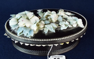 Pretty ceramic lidded trinket box with marble effect interior, leaves to top.