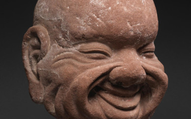 A rare sandstone head of a luohan